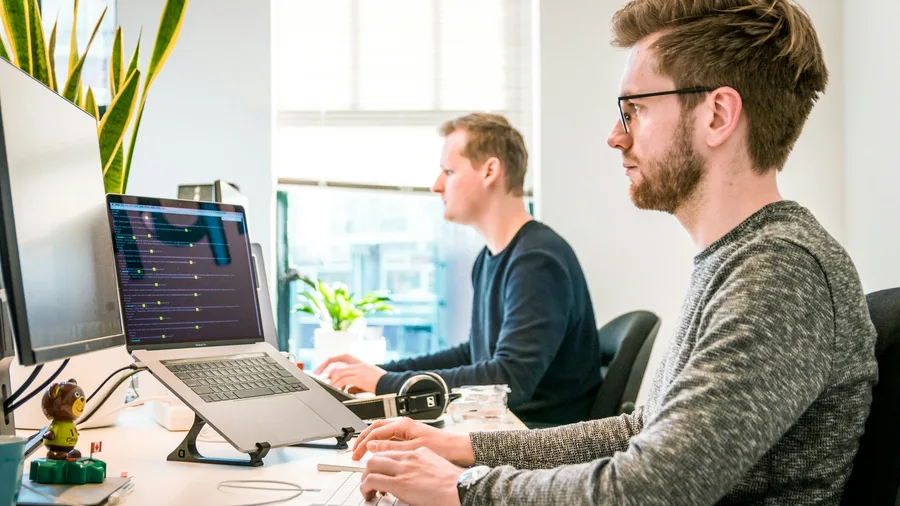 Product team collaborating on a B2B software platform in a modern office